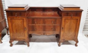 20th century mahogany sideboard with gadrooned carved borders, two panelled cupboard doors below two