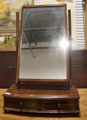 Stained wood toilet mirror, the rectangular plate on fluted uprights to the bowfront base, with