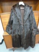 A vintage full length mink coat, broad, deep cuffs