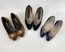 Vintage Russell and Bromley, dark tan patent leather with ribbon bow and brass coloured logo, size