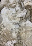 Large collection of mainly net lace pieces, lengths and other lace items (1 box)