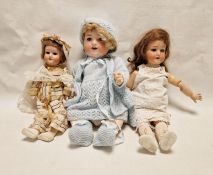 Schoenau & Hoffmeister bisque headed doll with sleeping brown eyes, open mouth and cream and black