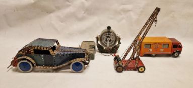 Tinplate Royal Mail van, a Meccano model clockwork car, a crane and a toy spotlight (4)