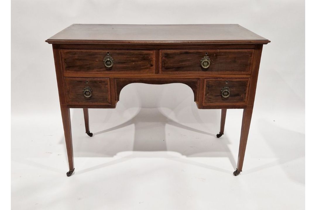 Edwardian mahogany inlaid kneehole inlaid lady's writing desk with an arrangement of four drawers