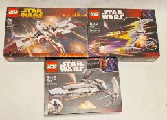 Three boxed Lego Star Wars sets to include 7663 Sith Infiltrator, 7660 Naboo N1 Starfighter and