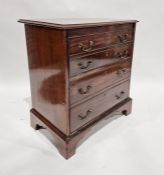Mahogany cupboard with two hinged doors (four dummy drawers), brass swan neck handles 74 x 65 cms