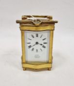 Early 20th century five glass carriage clock in bow fronted brass case retailed by 
