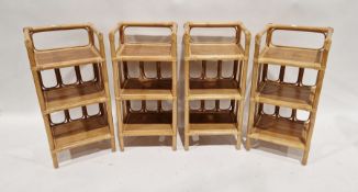 Set of four circa 1970's rattan and wicker pot stands, 70cm high x 33cm wide (4)