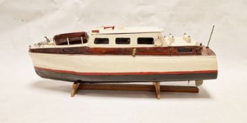 Painted Moda Cruiser battery operated on wooden stand, 55cm wide x 19cm high approx.