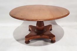 Victorian tilt-top breakfast table, circular with single baluster support quadruped base on bun feet