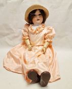 Armand Marseille bisque headed doll, no.390, stamped 'A17M' with brown sleeping eyes, jointed