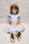 Schoenau & Hoffmeister bisque headed doll with sleeping blue eyes, open mouth, ball jointed