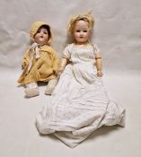 Armand Marseille 390 A10M bisque headed doll, cracks to face, composite body, 71cm approx. and an