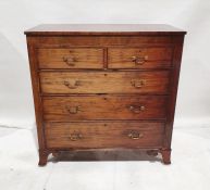 Georgian mahogany chest of two short over three long graduated drawers, on scrolled bracket feet