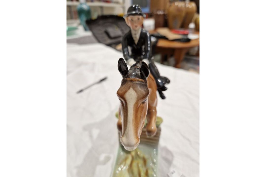 Beswick pottery model of a horse and rider jumping a fence, printed black marks, the female rider - Image 14 of 17