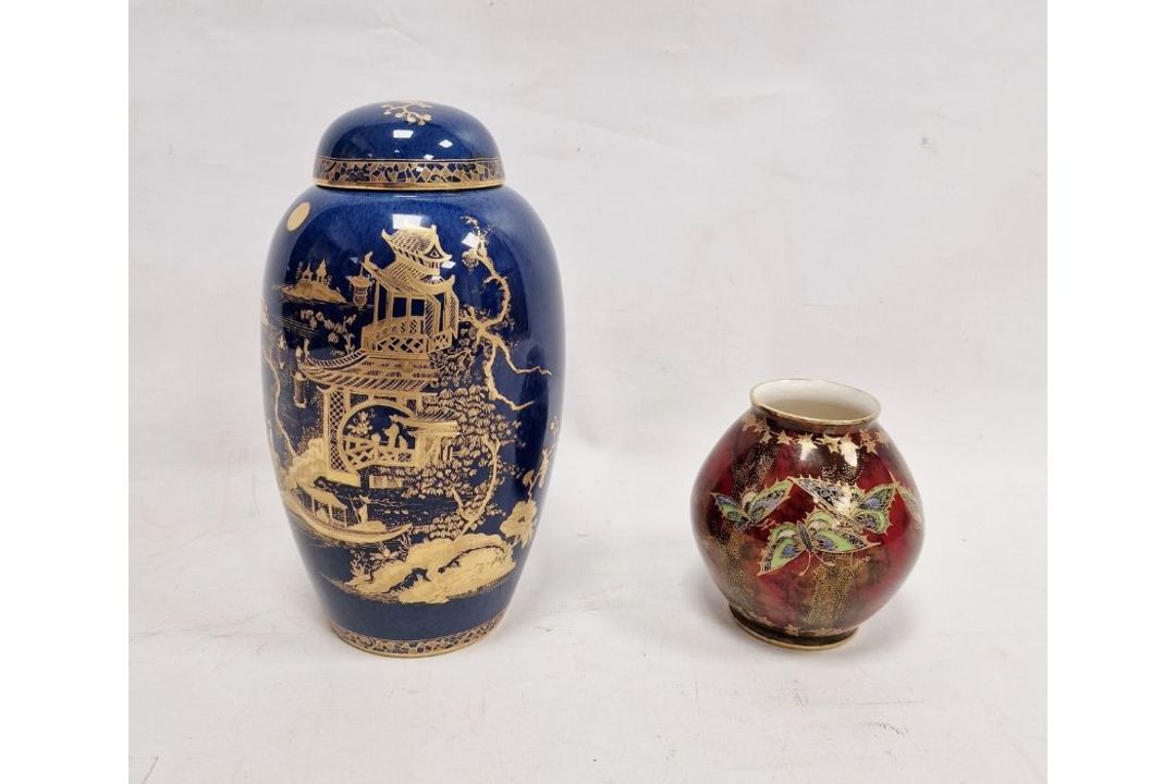 Crown Devon Fieldings lustred red oviform vase, printed in gilt with butterflies in woodland, and - Image 1 of 4