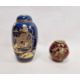 Crown Devon Fieldings lustred red oviform vase, printed in gilt with butterflies in woodland, and - Image 1 of 4
