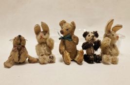 Sealskin miniature toy seal, a Schuco panda bear, a teddy bear and a pair of rabbits (1 box)