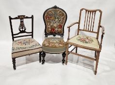 Victorian ebonised nursing chair with tapestry seat and two other chairs (3)