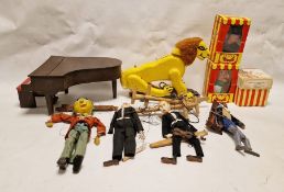 Two various papier mache and wood puppets, a painted wood grand piano with stool, a Pelham puppet of