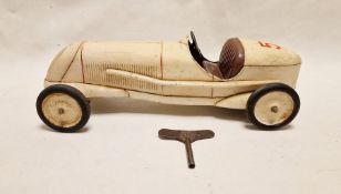 JEP French clockwork tinplate racing car, white with no.5, 47cm approx. Condition ReportMotor works.