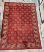 Modern Belgian Prado 'Royal Opera' red ground wool pile rug with five rows of eight and four rows of