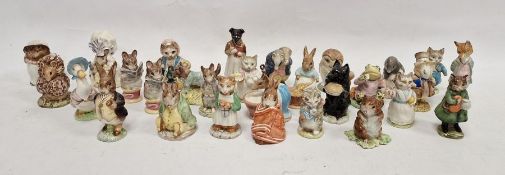 Twenty-nine Beswick Beatrix Potter figures, 20th century, printed brown and gilt mark for F. Warne &