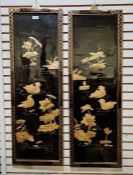 A pair of Chinese lacquer panels with applied decorations of flowers and birds, 91 x 30cm approx.