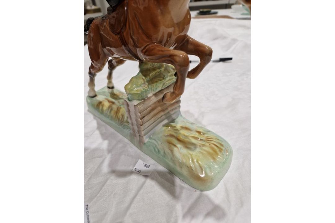 Beswick pottery model of a horse and rider jumping a fence, printed black marks, the female rider - Image 13 of 17