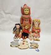 Early 20th century Chinese doll, small celluloid and other dolls, two fabric dolls and some doll's