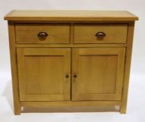 Modern Wiltshire light oak sideboard with two drawers and cupboards below, on straight supports