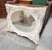 White painted rectangular framed wall mirror with oval bevelled mirror, 83cm wide