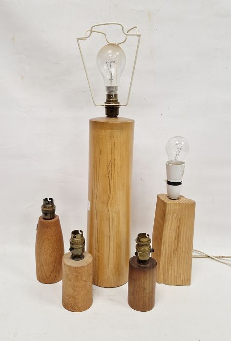 Large lightwood turned cylindrical table lamp, the base 38cm high, another smaller shaped