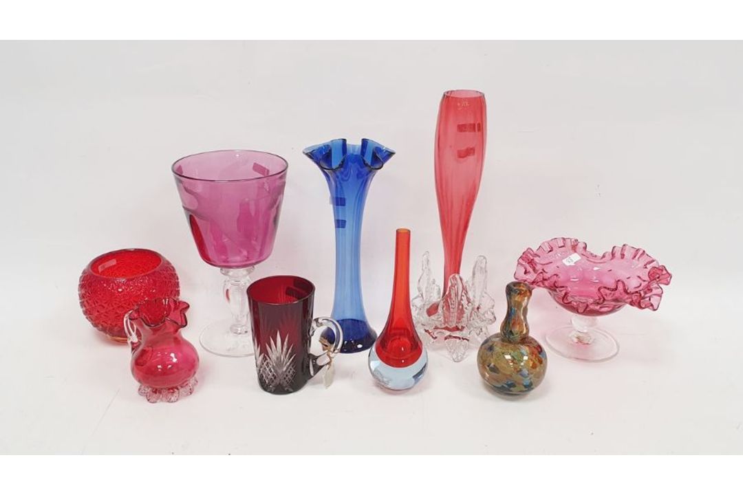Group of engraved and coloured glassware to include an amethyst tinted goblet on clear stem etched