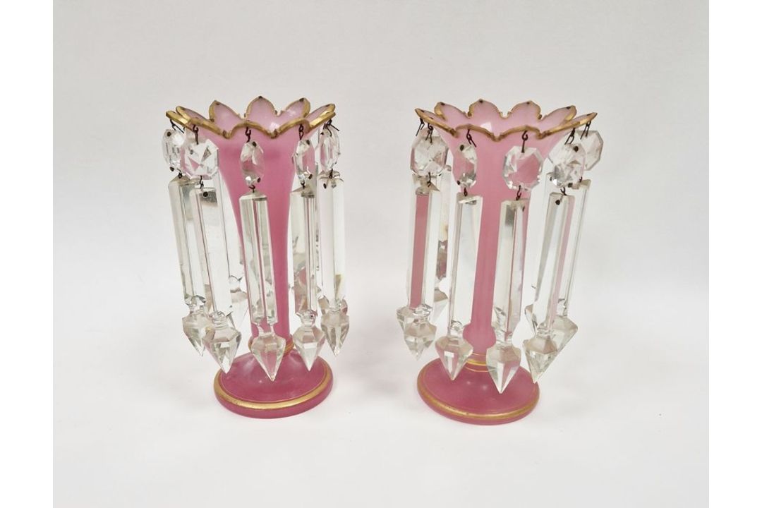 Pair of early 20th century pink glass lustres decorated with gilt banding, 22cm high (2)