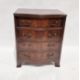 Reproduction mahogany serpentine-fronted chest of four long drawers, 75 x 61 x 44 cms a George II- - Image 1 of 3