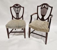 Pair of Georgian style mahogany carvers' armchairs with shield backs together with a set of four