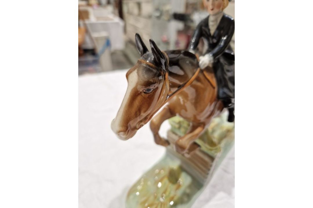 Beswick pottery model of a horse and rider jumping a fence, printed black marks, the female rider - Image 3 of 17