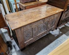 18th century carved oak coffer with carved panel front, on straight supports, 65 cms h. x 119cm wide