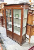 Edwardian mahogany glazed display cabinet, leaded glazed stained glass doors, bracket