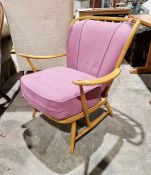 Ercol easy chair with padded seating together with similar Ercol easy chair  (2)Condition