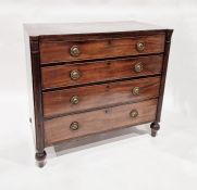 19th century mahogany chest of four graduating drawers, flanked by reeded columns, octagonal