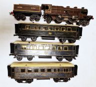 Hornby 'O' gauge Nord 31801 , 4-4-2 locomotive and tender together with three Hornby 'O' gauge