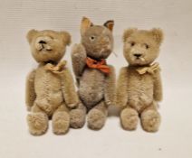 Pair of probably Schuco 'Yes/No' miniature plush bears (one with tail mechanism working), 14cm