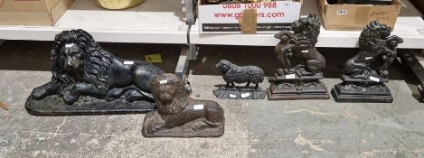 Collection of hollow back cast iron doorstops, four in the form of lions, two rampant and two