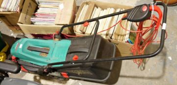 Bosch Rotak 340ER electric lawnmower, a Florabest electric lawn aerator/scarifier and a fertilizer/