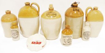 Quantity of stoneware flagons '3887 Geo Alyiffe Wine & Spirit Merchant, Dursley', 'Dobell & Co,