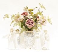 Nao, four figures, children in nightgowns, one carrying a box of  books, one slippers and a towel,