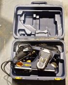 Electric three-blade planer in a carry case