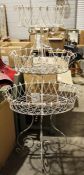 Early 20th century wire plant stand, with three tiered baskets on four supports, 150cm high x 78cm